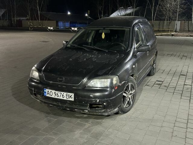 Черный Опель Астра, объемом двигателя 5 л и пробегом 350 тыс. км за 1750 $, фото 1 на Automoto.ua