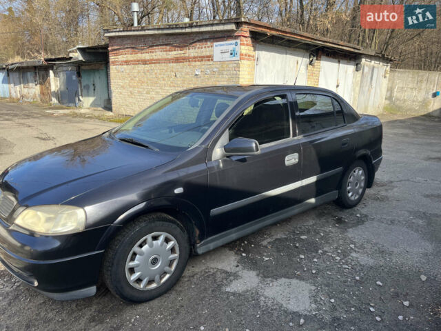 Черный Опель Астра, объемом двигателя 1.4 л и пробегом 232 тыс. км за 2900 $, фото 1 на Automoto.ua