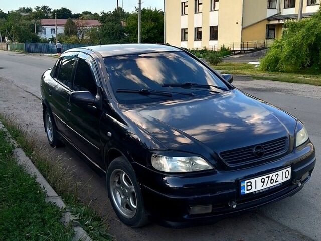Чорний Опель Астра, об'ємом двигуна 1.6 л та пробігом 193 тис. км за 2550 $, фото 1 на Automoto.ua
