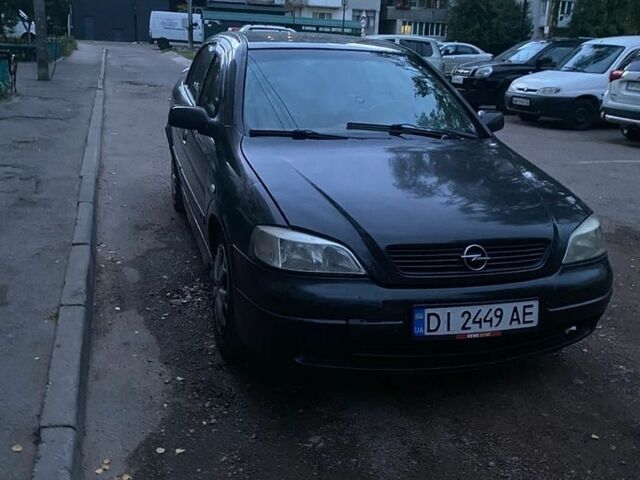 Черный Опель Астра, объемом двигателя 1.39 л и пробегом 270 тыс. км за 2600 $, фото 1 на Automoto.ua