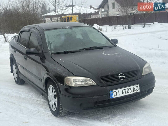 Чорний Опель Астра, об'ємом двигуна 1.4 л та пробігом 280 тис. км за 2350 $, фото 1 на Automoto.ua