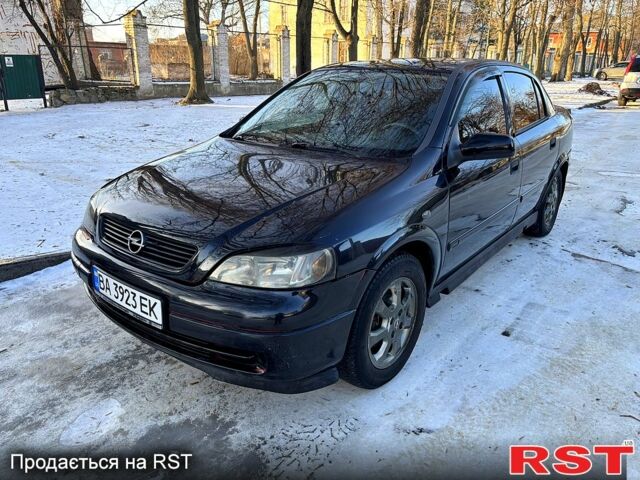 Черный Опель Астра, объемом двигателя 1.6 л и пробегом 100 тыс. км за 2900 $, фото 1 на Automoto.ua