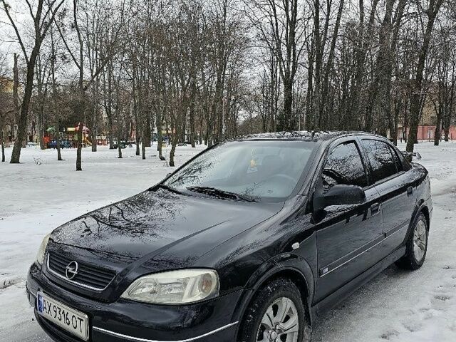 Черный Опель Астра, объемом двигателя 1.6 л и пробегом 282 тыс. км за 4477 $, фото 1 на Automoto.ua