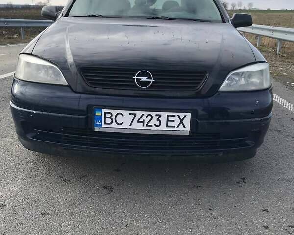 Черный Опель Астра, объемом двигателя 1.39 л и пробегом 265 тыс. км за 2100 $, фото 1 на Automoto.ua