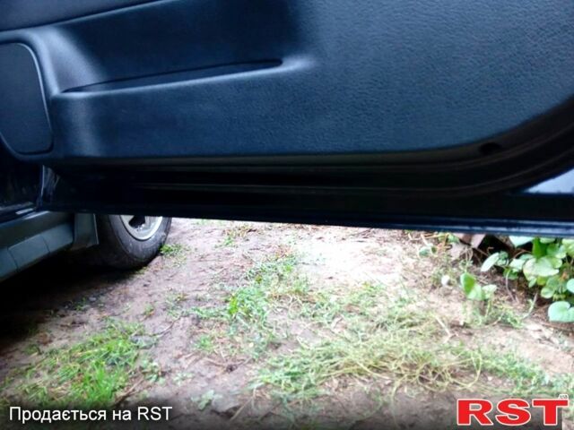 Черный Опель Астра, объемом двигателя 1.6 л и пробегом 145 тыс. км за 3650 $, фото 1 на Automoto.ua