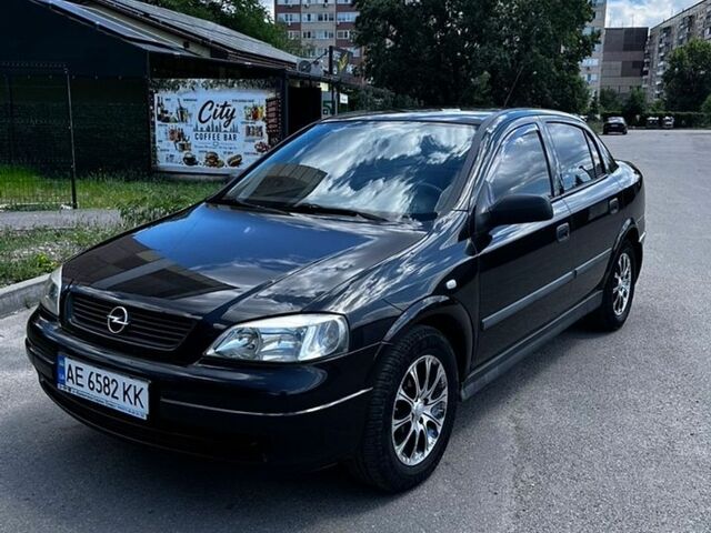 Черный Опель Астра, объемом двигателя 1.39 л и пробегом 215 тыс. км за 3500 $, фото 1 на Automoto.ua