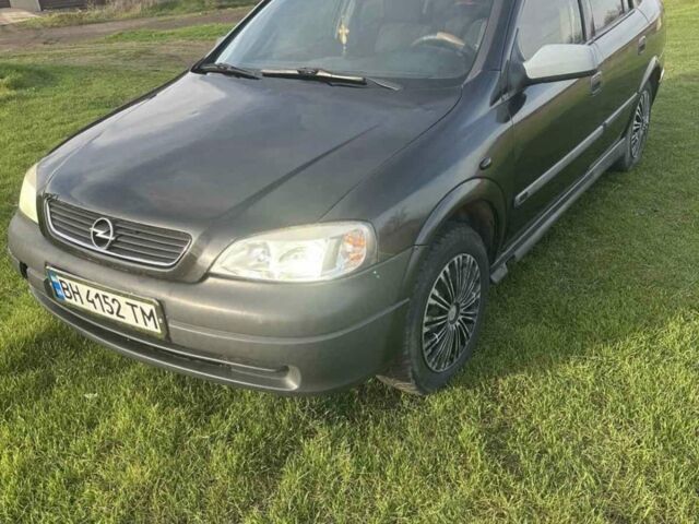 Черный Опель Астра, объемом двигателя 1.4 л и пробегом 215 тыс. км за 3500 $, фото 1 на Automoto.ua