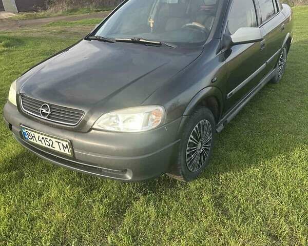 Черный Опель Астра, объемом двигателя 1.4 л и пробегом 215 тыс. км за 3500 $, фото 1 на Automoto.ua