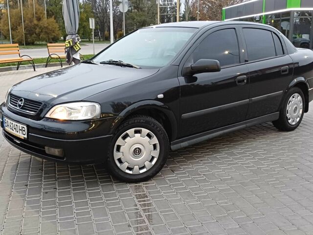 Черный Опель Астра, объемом двигателя 1.4 л и пробегом 166 тыс. км за 4700 $, фото 1 на Automoto.ua