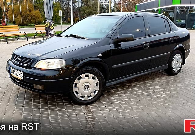 Чорний Опель Астра, об'ємом двигуна 1.4 л та пробігом 166 тис. км за 4700 $, фото 1 на Automoto.ua