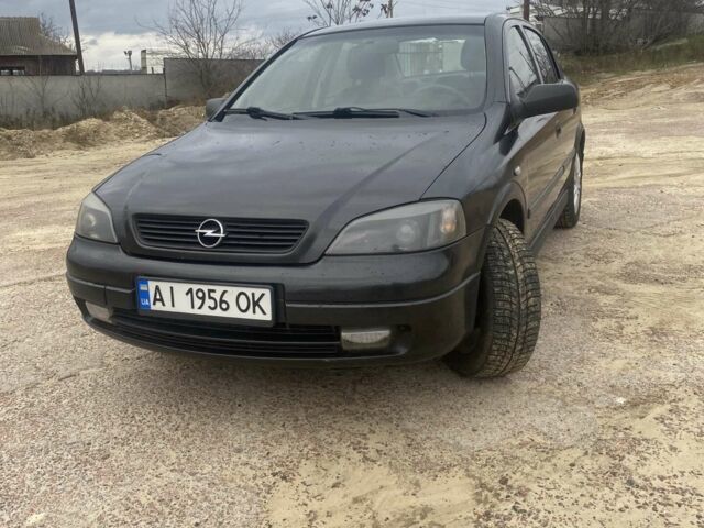 Черный Опель Астра, объемом двигателя 1.4 л и пробегом 349 тыс. км за 2550 $, фото 1 на Automoto.ua