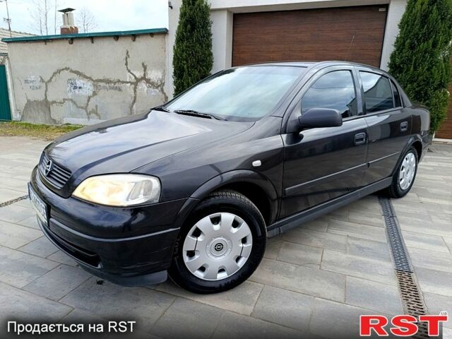 Черный Опель Астра, объемом двигателя 1.4 л и пробегом 110 тыс. км за 5450 $, фото 1 на Automoto.ua