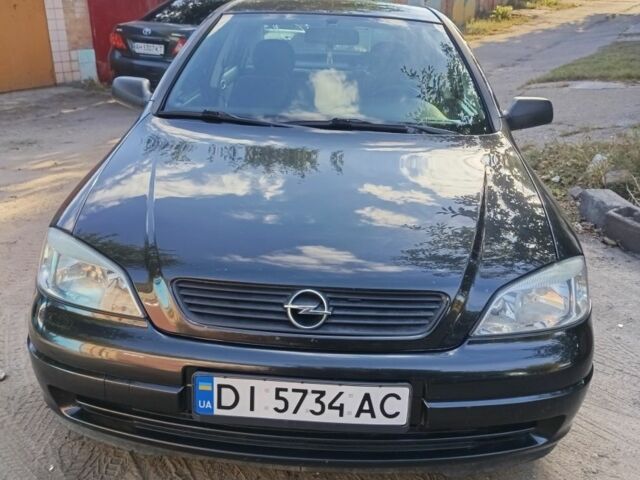 Черный Опель Астра, объемом двигателя 1.4 л и пробегом 136 тыс. км за 3900 $, фото 1 на Automoto.ua