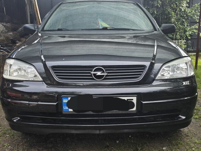 Черный Опель Астра, объемом двигателя 0 л и пробегом 217 тыс. км за 4000 $, фото 1 на Automoto.ua