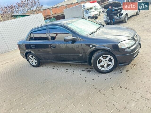 Чорний Опель Астра, об'ємом двигуна 1.39 л та пробігом 280 тис. км за 4500 $, фото 1 на Automoto.ua