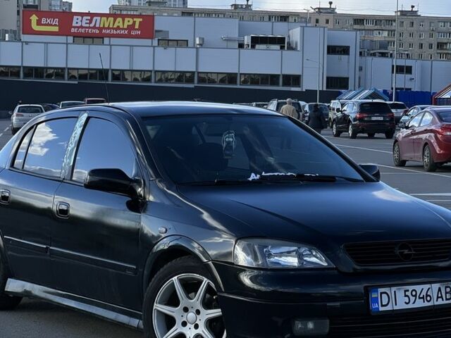 Черный Опель Астра, объемом двигателя 1.4 л и пробегом 185 тыс. км за 3000 $, фото 1 на Automoto.ua