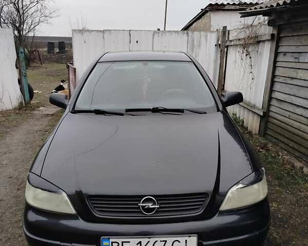 Черный Опель Астра, объемом двигателя 1.4 л и пробегом 210 тыс. км за 3700 $, фото 1 на Automoto.ua