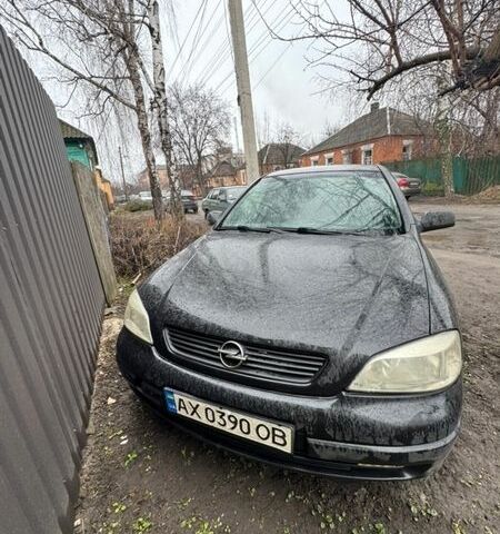 Черный Опель Астра, объемом двигателя 1.4 л и пробегом 210 тыс. км за 1500 $, фото 1 на Automoto.ua