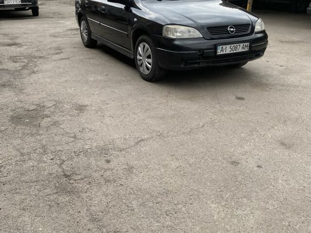 Чорний Опель Астра, об'ємом двигуна 1.4 л та пробігом 240 тис. км за 2900 $, фото 1 на Automoto.ua