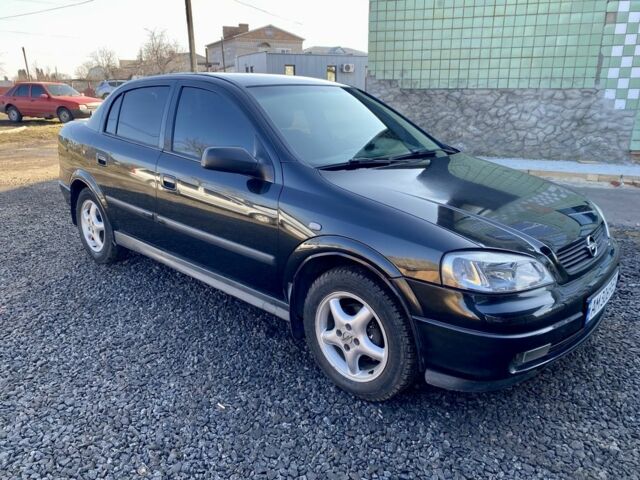 Черный Опель Астра, объемом двигателя 1.4 л и пробегом 196 тыс. км за 3600 $, фото 1 на Automoto.ua