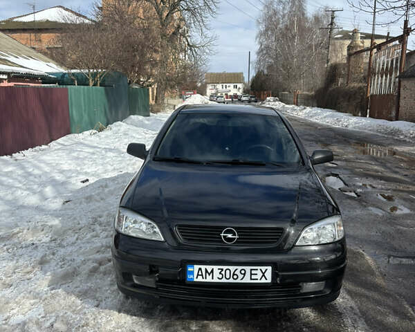 Черный Опель Астра, объемом двигателя 1.4 л и пробегом 198 тыс. км за 3500 $, фото 1 на Automoto.ua