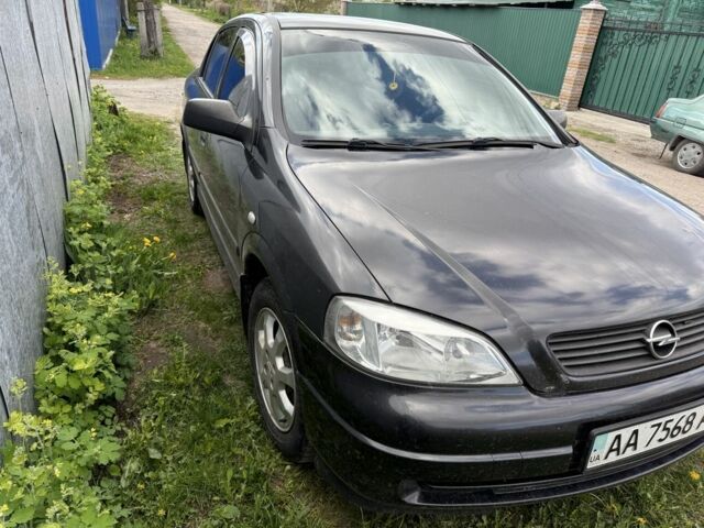 Черный Опель Астра, объемом двигателя 1.4 л и пробегом 202 тыс. км за 3500 $, фото 1 на Automoto.ua