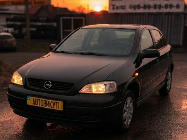 Черный Опель Астра, объемом двигателя 1.4 л и пробегом 184 тыс. км за 3900 $, фото 1 на Automoto.ua