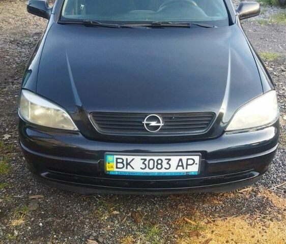 Черный Опель Астра, объемом двигателя 1.4 л и пробегом 250 тыс. км за 3400 $, фото 1 на Automoto.ua
