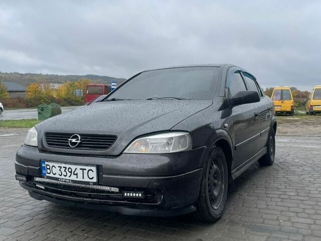 Черный Опель Астра, объемом двигателя 1.36 л и пробегом 215 тыс. км за 2750 $, фото 1 на Automoto.ua