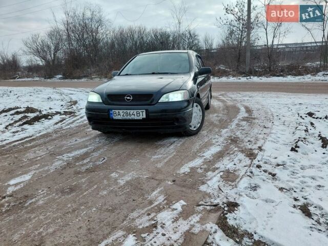 Черный Опель Астра, объемом двигателя 1.4 л и пробегом 179 тыс. км за 3700 $, фото 1 на Automoto.ua