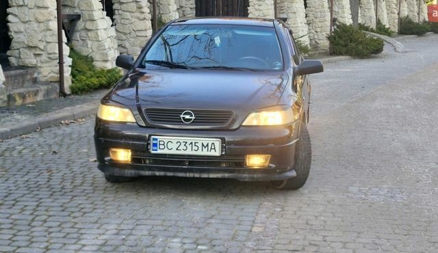 Чорний Опель Астра, об'ємом двигуна 1.4 л та пробігом 251 тис. км за 2900 $, фото 1 на Automoto.ua