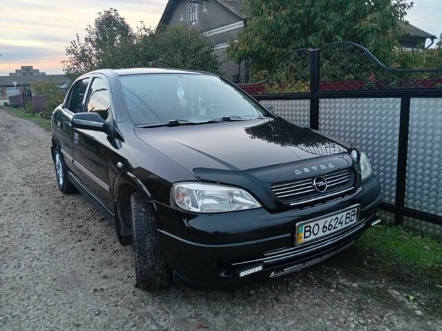 Черный Опель Астра, объемом двигателя 1.4 л и пробегом 200 тыс. км за 4000 $, фото 1 на Automoto.ua