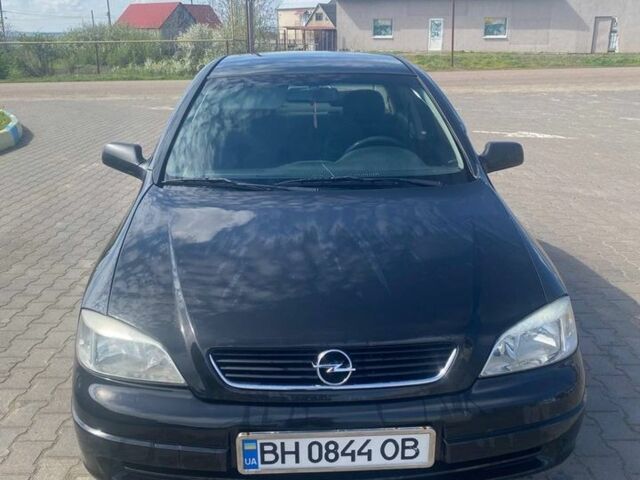 Черный Опель Астра, объемом двигателя 1.36 л и пробегом 318 тыс. км за 2600 $, фото 1 на Automoto.ua