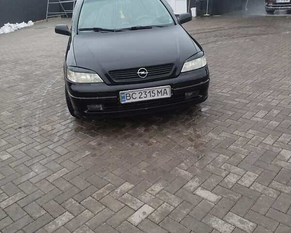 Черный Опель Астра, объемом двигателя 1.39 л и пробегом 250 тыс. км за 2700 $, фото 1 на Automoto.ua