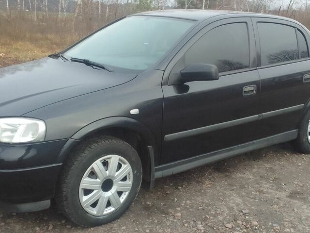 Черный Опель Астра, объемом двигателя 1.4 л и пробегом 351 тыс. км за 3333 $, фото 1 на Automoto.ua