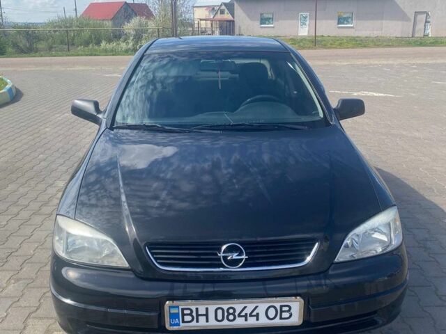 Черный Опель Астра, объемом двигателя 1.36 л и пробегом 318 тыс. км за 2600 $, фото 1 на Automoto.ua