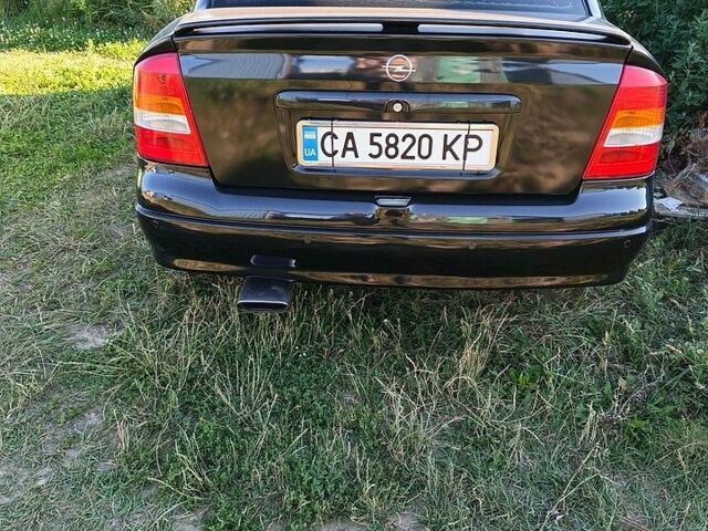Чорний Опель Астра, об'ємом двигуна 1.4 л та пробігом 212 тис. км за 4300 $, фото 1 на Automoto.ua