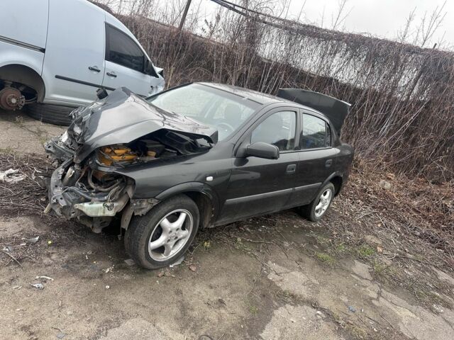 Черный Опель Астра, объемом двигателя 1.4 л и пробегом 150 тыс. км за 900 $, фото 1 на Automoto.ua