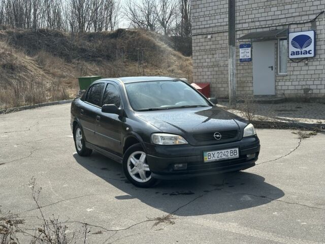 Черный Опель Астра, объемом двигателя 1.4 л и пробегом 265 тыс. км за 3900 $, фото 1 на Automoto.ua