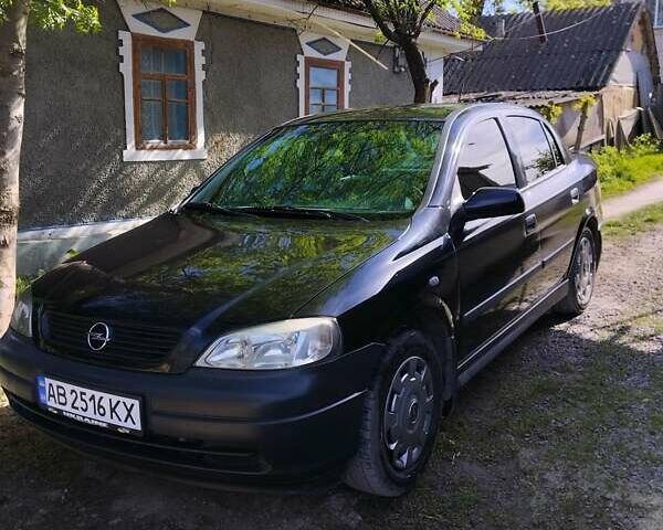 Черный Опель Астра, объемом двигателя 1.4 л и пробегом 304 тыс. км за 3650 $, фото 1 на Automoto.ua
