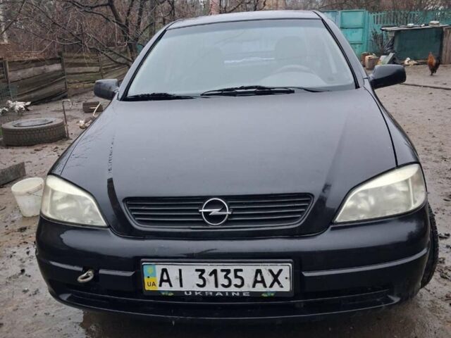 Чорний Опель Астра, об'ємом двигуна 1.4 л та пробігом 200 тис. км за 2200 $, фото 1 на Automoto.ua