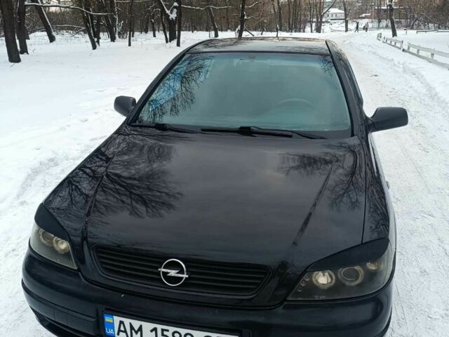 Черный Опель Астра, объемом двигателя 1.4 л и пробегом 200 тыс. км за 3200 $, фото 1 на Automoto.ua