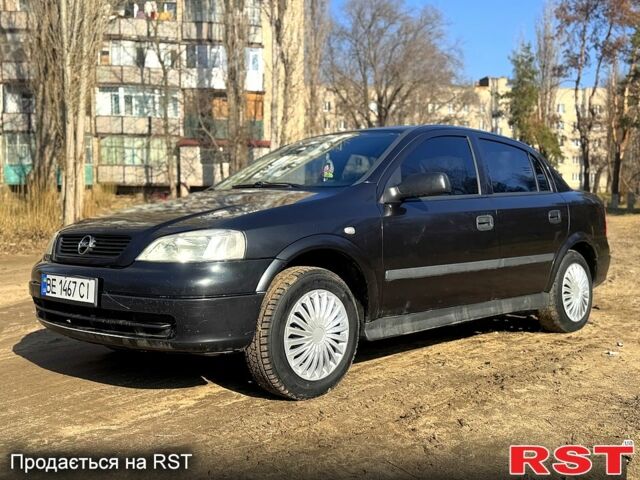 Черный Опель Астра, объемом двигателя 1.4 л и пробегом 211 тыс. км за 3650 $, фото 1 на Automoto.ua