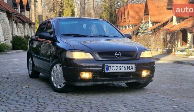 Черный Опель Астра, объемом двигателя 1.39 л и пробегом 251 тыс. км за 2999 $, фото 1 на Automoto.ua