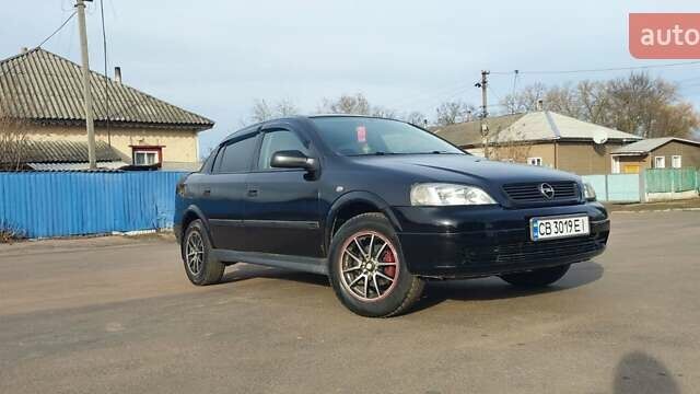 Чорний Опель Астра, об'ємом двигуна 1.4 л та пробігом 200 тис. км за 3299 $, фото 1 на Automoto.ua