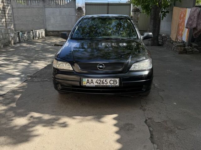 Черный Опель Астра, объемом двигателя 1.4 л и пробегом 199 тыс. км за 3572 $, фото 1 на Automoto.ua