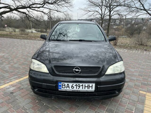 Черный Опель Астра, объемом двигателя 1.6 л и пробегом 247 тыс. км за 4400 $, фото 1 на Automoto.ua