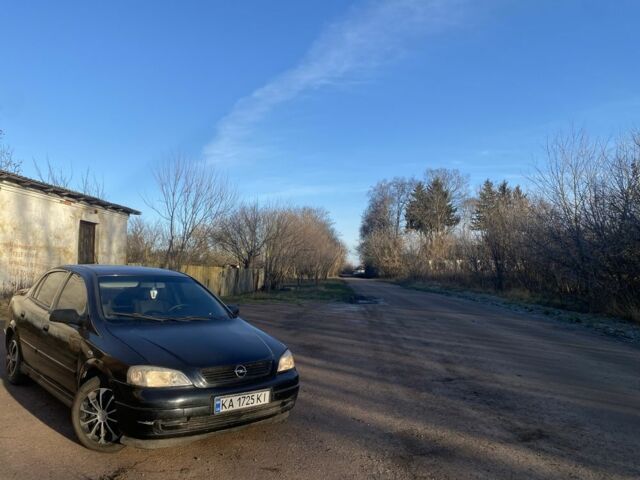 Черный Опель Астра, объемом двигателя 1.4 л и пробегом 219 тыс. км за 3400 $, фото 1 на Automoto.ua