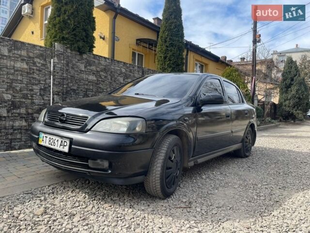 Черный Опель Астра, объемом двигателя 1.4 л и пробегом 280 тыс. км за 2700 $, фото 1 на Automoto.ua