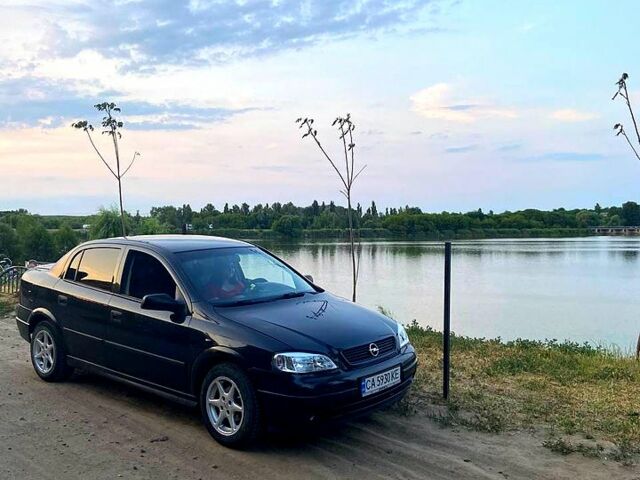 Черный Опель Астра, объемом двигателя 1.6 л и пробегом 285 тыс. км за 3400 $, фото 1 на Automoto.ua